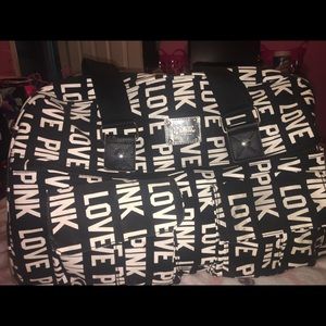 pink rolling duffel bag